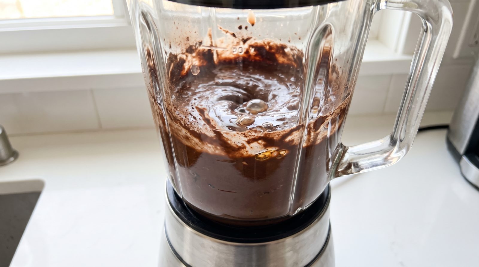 Black beans, cocoa and eggs blended into smooth dark brownie batter
