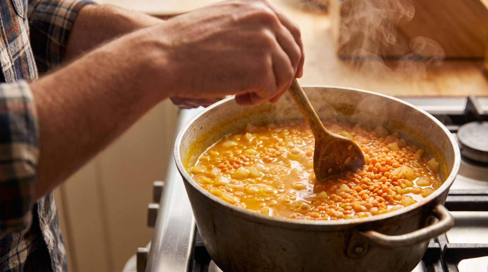 Red lentils simmering in golden spiced broth